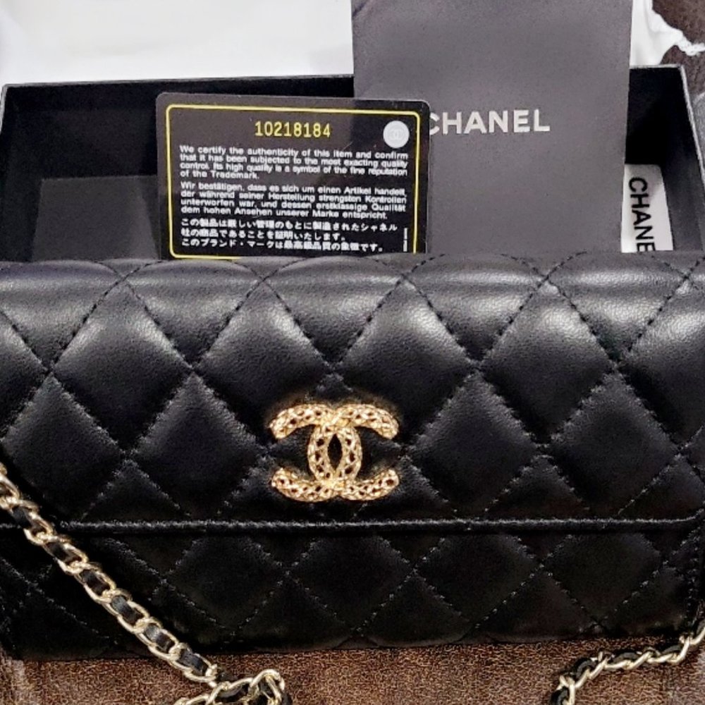 Black cc woc wallet on a chain